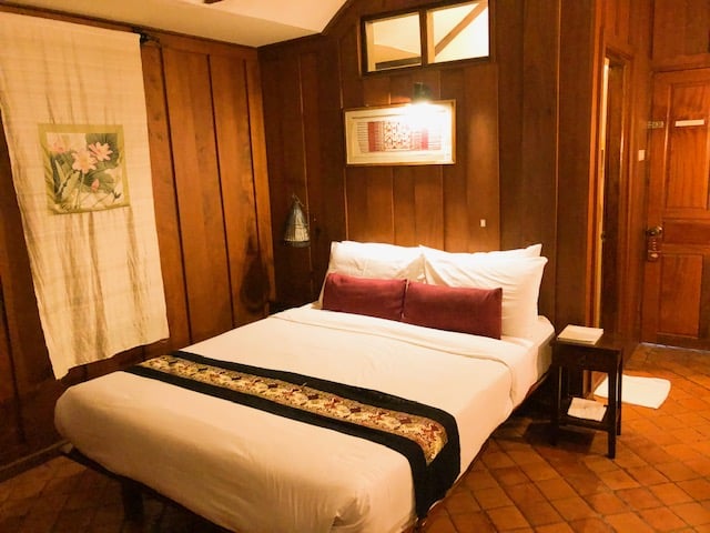 luang prabang province, unesco world heritage, best hotels in luang prabang, bed in a hotel room