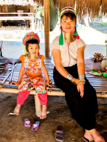 longneck karen, kayan, long neck karen, woman wearing indigenous attire, brass neck rings, woman and girl wearing brass rings around neck