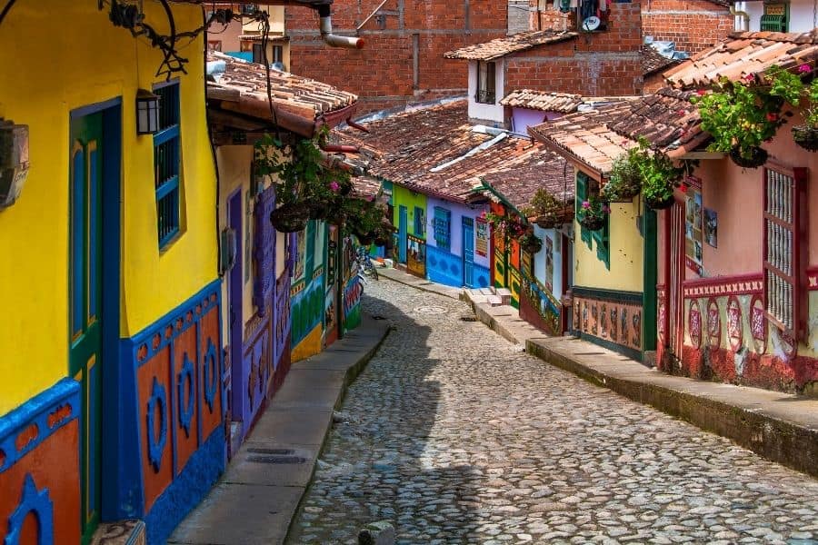 brightly colored homes and cobblestone streets, guatape, colombia