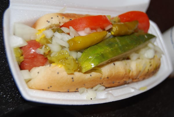 hot dog with tomatoes pickles relish and onions, chicago style dog, chicago style hot dog, chicago hot dog, what to eat in chicago, things to eat in chicago, chicago foods