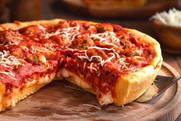 deep dish pizza with cheese and meat