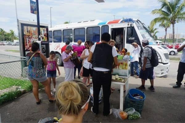people waiting to board the bus, best things to do in puerto Vallarta