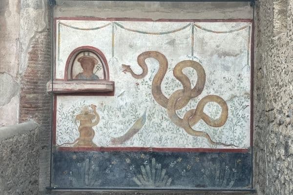 fresco of serpents, visit pompeii, pompeii artifacts, a day in pompeii