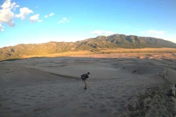 sand boarding in the park, great sand dunes in colorado