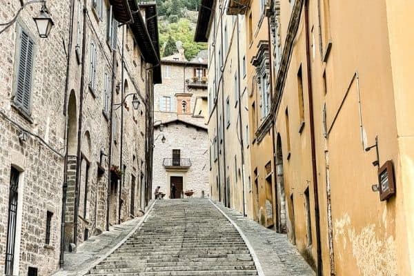 alley in gubbio, cobblestone streets