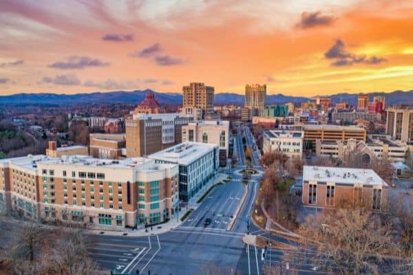 aerial view of asheville, sunset, places to visit in north carolina