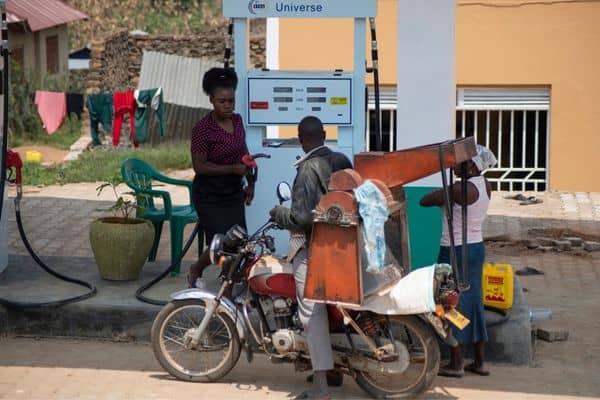 boda driving getting gas at arusha gas station