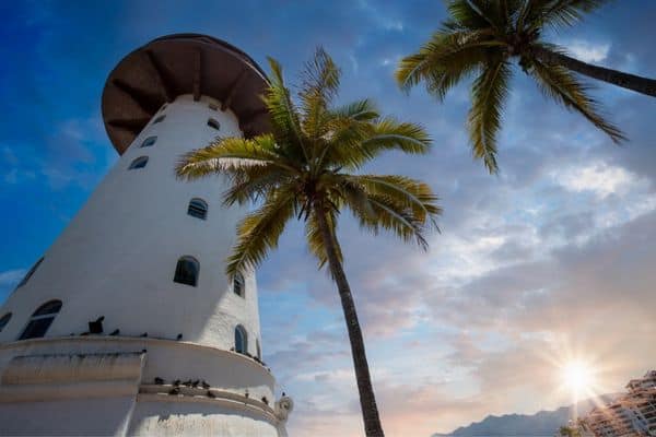 lighthouse, los muertos beach, palm trees, nightlife in puerto vallarta