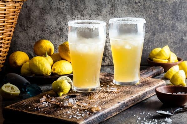 craft beer in cold glasses, lemons, craft beer
