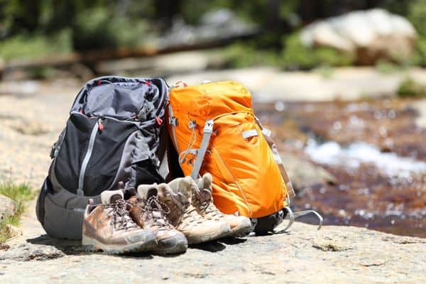 orange and black hiking backpacks, hiking boots, travel backpacks women, hiking backpacks for women