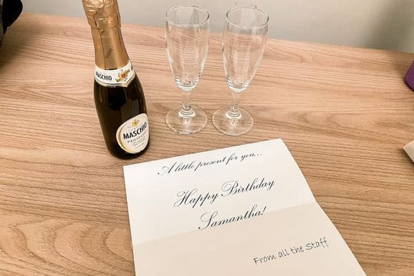 small bottle of champagne with two glasses, happy birthday note from hotel, best places to stay in sorrento, accommodation in sorrento, best hotels in sorrento