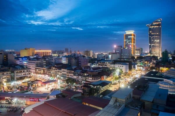 nighttime in phnom penh, large buildings with lights on, phnom penh nightlife, best bars in phnom penh, attractions phnom penh