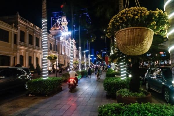 quiet street in saigon, people walking at night, ho chi minh city nightlife, visiting ho chi minh city 