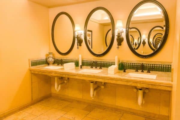 sinks and mirrors in with luxury soaps and cosmetics 