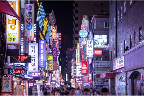 nighttime at a street in myeongdong, things to buy in seoul, one day in seoul, what to see in seoul