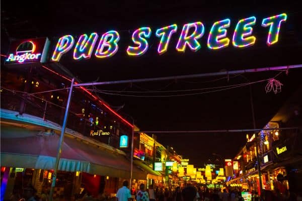 neon lit sign of the entrance to pub street in siem reap, things to do in siem reap, what to do in siem reap