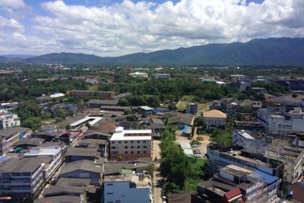 high up view of chanthaburi, homes and other buildings, moutains in the distance, chanthaburi thailand, living in chanthaburi