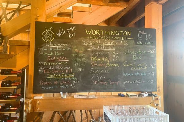chalkboard showing the menu at Worthington winery, white wine, wine slushies, sangrias, wine flights, wineries in connecticut, wine tours in ct, ct wine tour, ct wine trail
