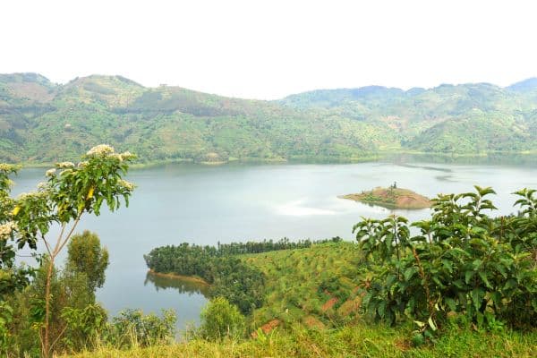 lake rudondo, big green hills in the background, small island in the middle of the lake, tourist attractions in rwanda, day trips from kigali, kigali city