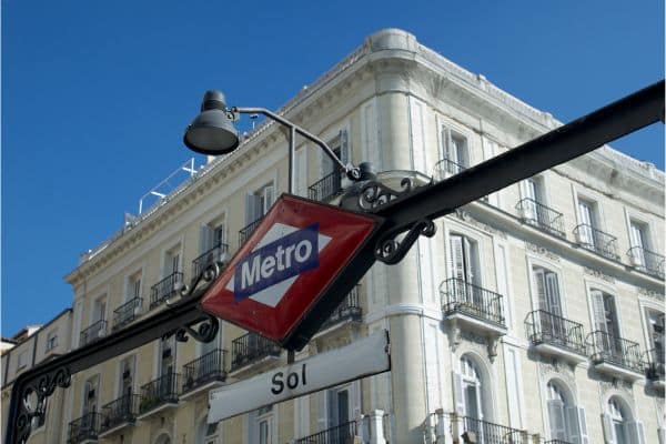 metro sign in madrid showing the stop for sol neighborhood, areas in madrid, hotels in madrid central, madrid where to stay