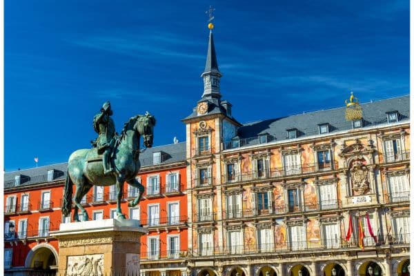 phillip square in madrid, king philip riding on a horse statue right in the middle of the square 