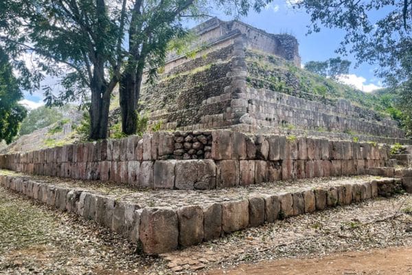 mayan ruins, ancient temple surrounded by trees, what to do in merida mexico, merida mexico ruins, places to see in merida, things to do in merida yucatan mexico