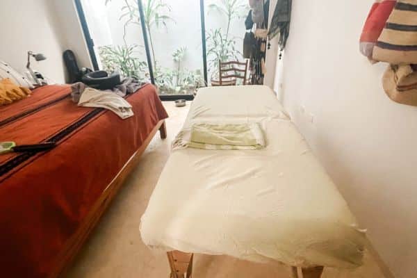 inside of massage room, massage table with fresh linen and towels, best things to do in merida mexico