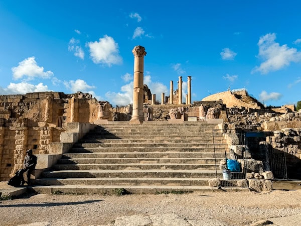 some of the remains and columns standing tall in jerash, jordan and egypt, g adventures jordan
